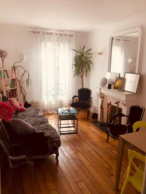 Coin salon dans l'établissement appartement Cozy Paris Canal St Martin