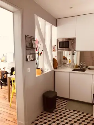Cuisine ou kitchenette dans l'établissement appartement Cozy Paris Canal St Martin