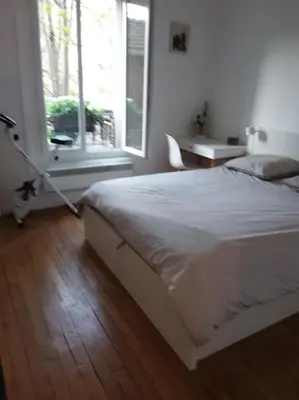 Un ou plusieurs lits dans un hébergement de l'établissement Appartement 40 m2 à, Boulogne Billancourt