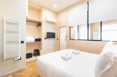 Un ou plusieurs lits dans un hébergement de l'établissement Family Apartment near Invalides -Rodin-Orsay Museum