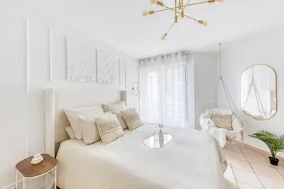 Un ou plusieurs lits dans un hébergement de l'établissement Superbe appartement au Sud de Paris