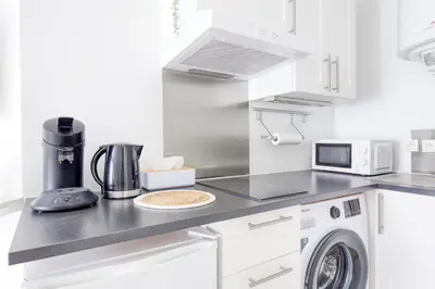 Cuisine ou kitchenette dans l'établissement Superbe appartement au Sud de Paris