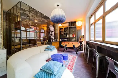 Coin salon dans l'établissement Lab Loft à Bastille 110m2