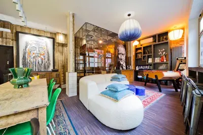 Coin salon dans l'établissement Lab Loft à Bastille 110m2