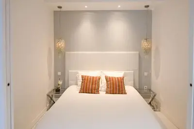 Un ou plusieurs lits dans un hébergement de l'établissement Modern & peaceful 1BD APT by Champs-Elysees with AC