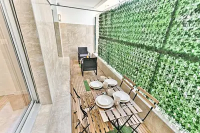 Coin salon dans l'établissement Appartement spacieux et paisible Paris 19ème - II