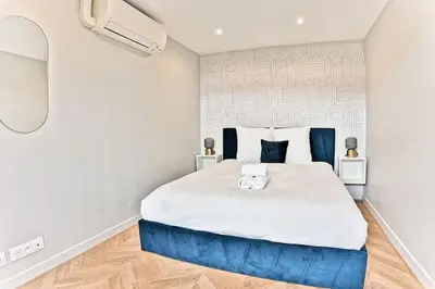 Un ou plusieurs lits dans un hébergement de l'établissement Appartement spacieux et paisible Paris 19ème - II