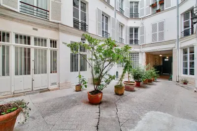 Jardin de l'établissement Charming duplex - heart of Paris