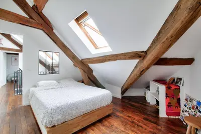 Un ou plusieurs lits dans un hébergement de l'établissement Charming duplex - heart of Paris