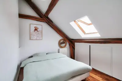 Un ou plusieurs lits dans un hébergement de l'établissement Charming duplex - heart of Paris
