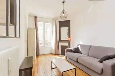 Coin salon dans l'établissement Cocon parisien lumineux central