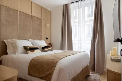Un ou plusieurs lits dans un hébergement de l'établissement Apt Exceptional - AC - 3BR-8P- Gare de l 'Est