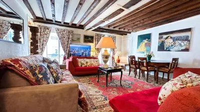Coin salon dans l'établissement Spacious Apartment in Montparnasse