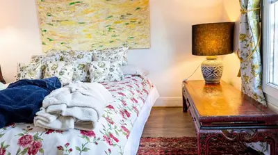 Un ou plusieurs lits dans un hébergement de l'établissement Spacious Apartment in Montparnasse