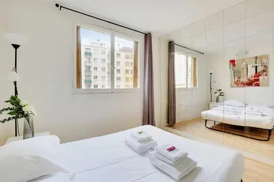 Un ou plusieurs lits dans un hébergement de l'établissement Charming apartment - 2BR-6P - Paris Expo