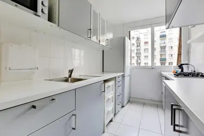 Cuisine ou kitchenette dans l'établissement Charming apartment - 2BR-6P - Paris Expo