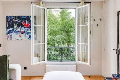 Un ou plusieurs lits dans un hébergement de l'établissement Bel appartement 2 pièces place de la République 75011