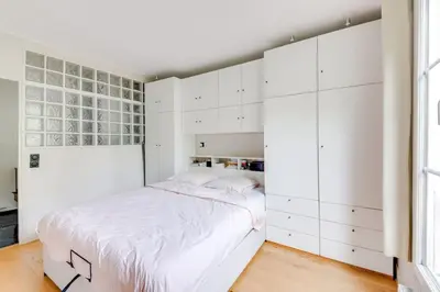 Un ou plusieurs lits dans un hébergement de l'établissement Bel appartement 2 pièces place de la République 75011