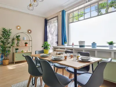 Coin salon dans l'établissement Élégant Appartement à Paris 16e