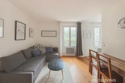 Coin salon dans l'établissement Flexliving - One bedroom - Houdon