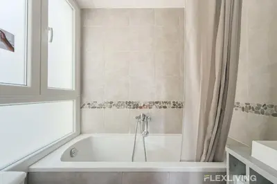 Salle de bains dans l'établissement Flexliving - One bedroom - Houdon
