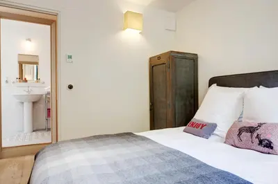 Un ou plusieurs lits dans un hébergement de l'établissement Paris Green House residence