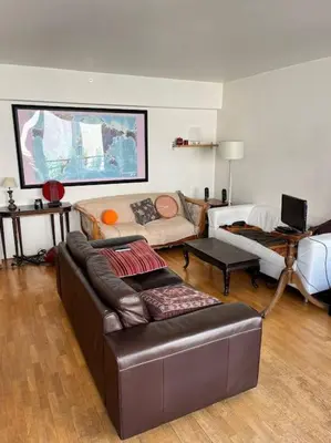 Coin salon dans l'établissement 3 chambres terrasse et parking gratuit