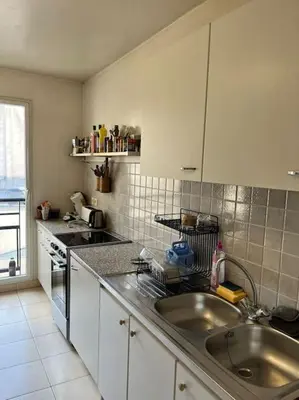 Cuisine ou kitchenette dans l'établissement 3 chambres terrasse et parking gratuit