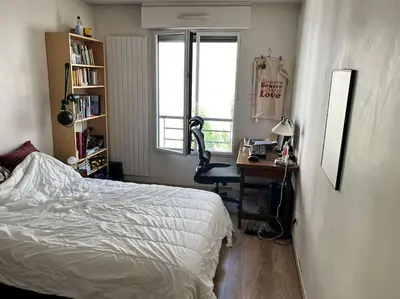 Un ou plusieurs lits dans un hébergement de l'établissement 3 chambres terrasse et parking gratuit