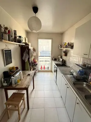 Cuisine ou kitchenette dans l'établissement 3 chambres terrasse et parking gratuit