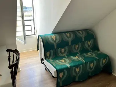 Coin salon dans l'établissement 3 chambres terrasse et parking gratuit