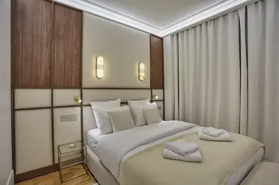 Un ou plusieurs lits dans un hébergement de l'établissement Apartment Matignon St Honore by Studio Prestige