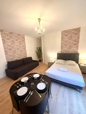 Coin salon dans l'établissement Appartement Monthiers Paris