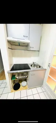 Cuisine ou kitchenette dans l'établissement Appartement Monthiers Paris