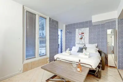 Un ou plusieurs lits dans un hébergement de l'établissement Paris Maison Lombards Terrasse
