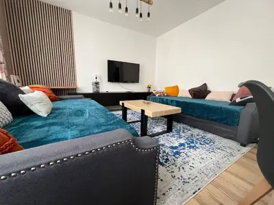 Coin salon dans l'établissement KB 21 - Metro 7 - AC - Free Parking - 4 pers
