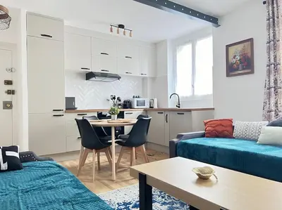 Coin salon dans l'établissement KB 21 - Metro 7 - AC - Free Parking - 4 pers