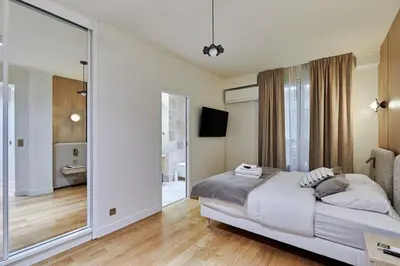 Un ou plusieurs lits dans un hébergement de l'établissement Terrace apartment Trocadero Eiffel Tower by Studio Prestige