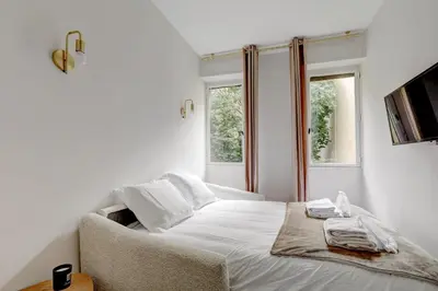 Un ou plusieurs lits dans un hébergement de l'établissement Bluestay 806 - Superb studio