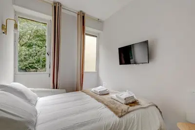 Un ou plusieurs lits dans un hébergement de l'établissement Bluestay 806 - Superb studio