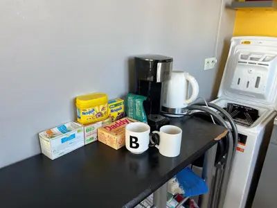 Cuisine ou kitchenette dans l'établissement Beau studio avec vue sur Paris