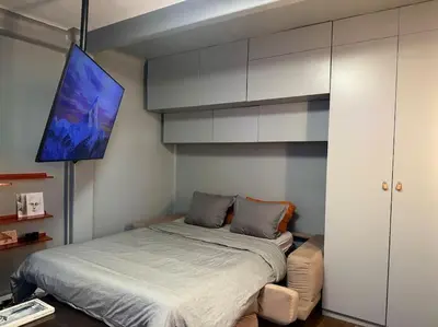 Un ou plusieurs lits dans un hébergement de l'établissement Charming Paris Studio Apartment