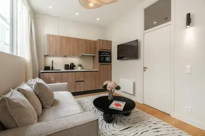 Cuisine ou kitchenette dans l'établissement Splendide appartement de luxe Saint-Germain