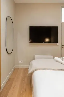 Un ou plusieurs lits dans un hébergement de l'établissement Splendide appartement de luxe Saint-Germain