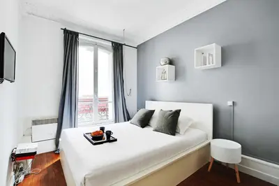 Un ou plusieurs lits dans un hébergement de l'établissement Lovely 1BR - 4P - Montmartre - Sacre coeur