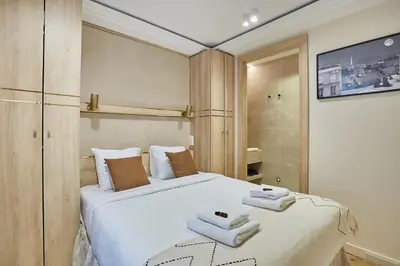 Un ou plusieurs lits dans un hébergement de l'établissement Sublime apartment in the heart of Paris 4 people FBMAR1 by Studioprestige