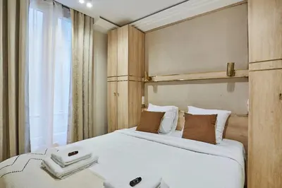 Un ou plusieurs lits dans un hébergement de l'établissement Sublime apartment in the heart of Paris 4 people FBMAR1 by Studioprestige