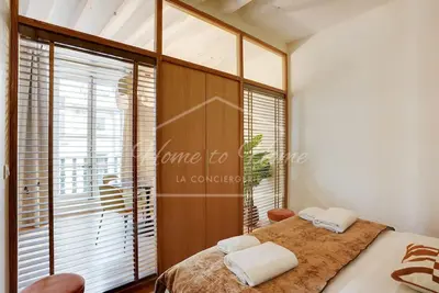 Un ou plusieurs lits dans un hébergement de l'établissement Le Marais Luxury & Charm 70m of Design