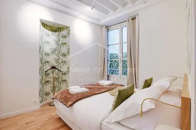 Un ou plusieurs lits dans un hébergement de l'établissement Le Marais Luxury & Charm 70m of Design