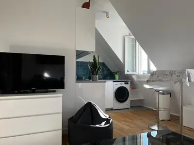 Télévision ou salle de divertissement dans l'établissement Apartment Paris Bail Mobility